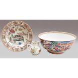 A Chinese punch bowl, Qianlong, painted in coloured enamels with figures in garden landscapes,