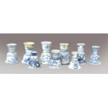 Nine Chinese blue and white candle stands of bell form, 19th century and later (a/f) (one tray)