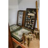 A pair of brass carriage lamps, a brass bugle stand, five framed sets of cigarette cards