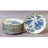 A set of eight Japanese Meiji period scalloped Imari dishes, painted in underglaze blue and