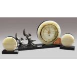 A selection of clocks including an Art deco green onyx and black slate mantel timepiece with