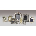 Nine various Victorian and later silver photograph frames, one housing a thermometerHeavy wear