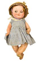 Armand Marseille 323 Bisque Socket Head Doll, with brown googley sleeping eyes, closed mouth,