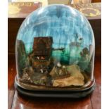 A Victorian diorama cased under an oval glass dome, a coastal scene depicting a building with a