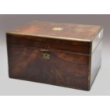 A Victorian brass mounted rosewood vanity box with fully fitted interior, the cover with inset brass