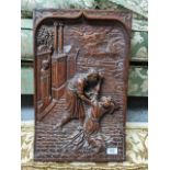 A Continental walnut plaque carved in high relief with a scene, possibly the Conversion of St Paul