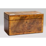 A Victorian tea caddy, figured walnut crossbanded in tulipwood, with fitted interior, a pair of