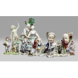 A pair of 19th century German porcelain busts of children by Helena Wolfsohn, together with two