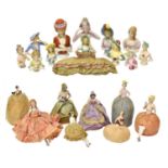 Collection of Circa 1920s and Later China Half Dolls and Pin Cushion Dolls, comprising eight pin