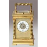 A brass striking and repeating carriage clock, circa 1900, Corinthean capped side columns,