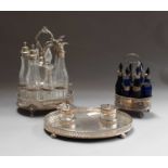 A Georgian silver six bottle cruet set, passant mark only, with six faceted Bristol blue glass