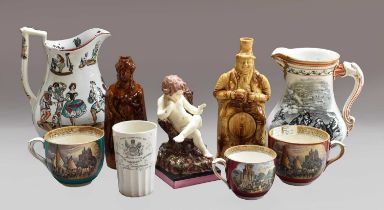 A group of 19th century ceramics, including a Wood & Cauldwell creamware figure of a seated puto,