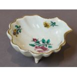 A Bow shell moulded pickle dish, circa 1755, painted in coloured enamels with flower sprigs and with