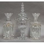 A glass pedstal bowl and cover, 19th century, flat cut, with triple tiered knop and with baluster