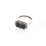 A sapphire and diamond triple cluster ring, finger size M1/2It is hallmarked however the marks are