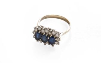 A sapphire and diamond triple cluster ring, finger size M1/2It is hallmarked however the marks are