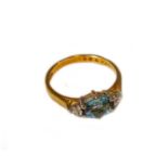 An 18 carat gold aquamarine and diamond ring, finger size K1/2Gross weight 3.1 grams.