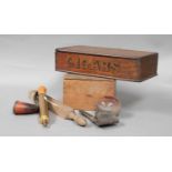 A late 19th century mahogany cigar vendors box, with painted lettering; together with coins,