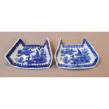 A pair of Worcester asparagus servers, circa 1775, printed in underglaze blue with the Fisherman and