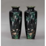 A pair of Japanese Meiji period cloisonne vases, blue ground decorated with birds and wisteria (2)