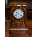 A rosewood inlaid striking mantel clock, mid 19th century, twin-barrel movement with outside