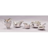 A Collection of Assorted Silver, comprising: a cream-jug with crimped border and flower cast handle,