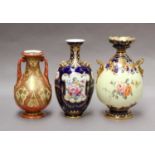 Three various Royal Crown Derby vases, the tallest 22cmBlue ground vase with heavy gilt wear, twin
