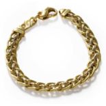 An 18 carat gold fancy link bracelet, length 19.3cmGross weight 30.7 grams.