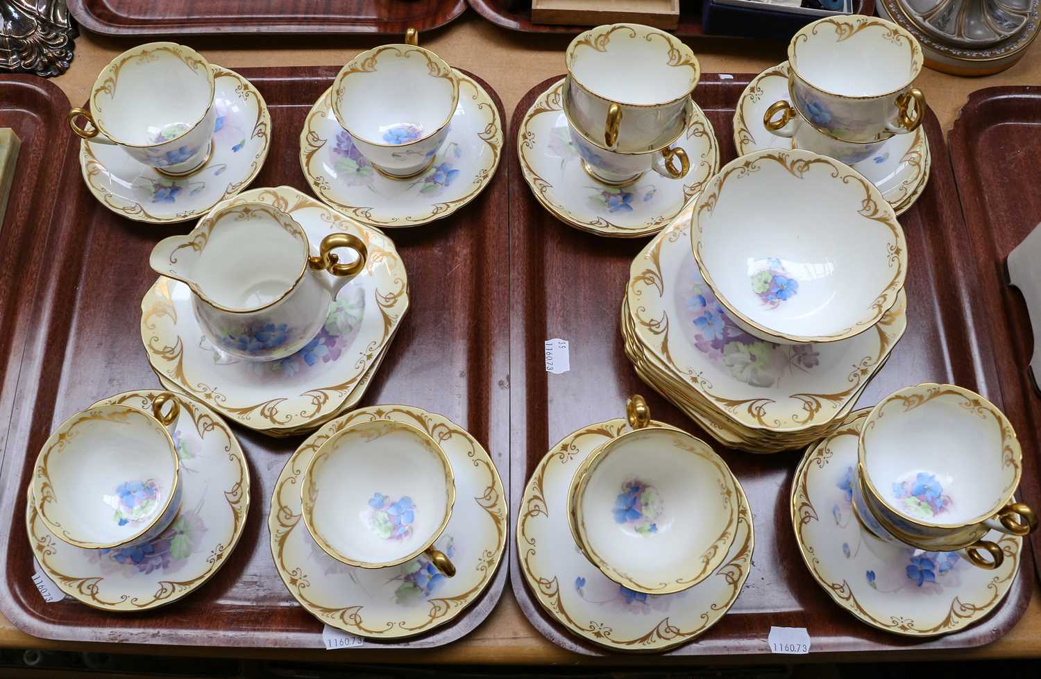 A 1920's/30's Shelley part tea service decorated with blue floral sprays (two trays)