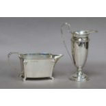 Two Silver Cream Jugs, one by Stower and Wragg Ltd., Sheffield, 1939, oblong and on four pad feet,