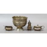 Asmall silver pedestal bowl, together with two silver mustard pots, silver pepperette, a silver