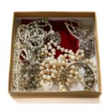 Two silver brooches; another brooch/pendant; a paste necklace; and three cultured pearl necklaces