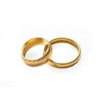 Two 22 carat gold band rings, finger sizes J and RGross weight 12.3 grams.