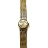 A lady's 9 carat gold Longines wristwatch, 1968, manual wound lever movement, silvered dial with