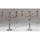 A Pair of Silver Plate Three-Light Candelabra, each on square base with shell corners, 47.5cm