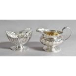 A George IV Silver Cream Jug and a Victorian Silver Sugar Bowl, The First Maker's Mark Rubbed,