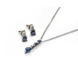 A sapphire and diamond pendant on chain, both stamped '750', pendant length 2.1cm, chain length