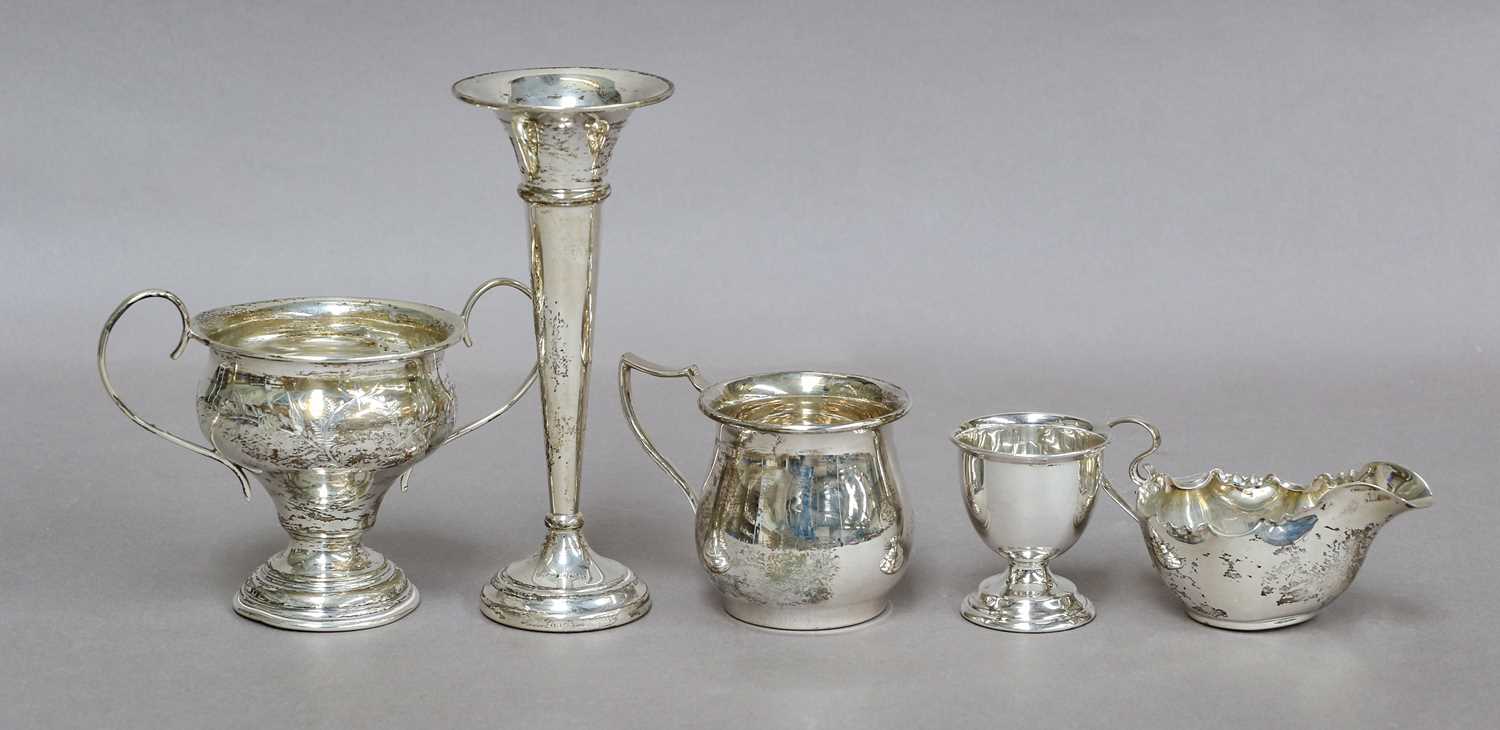 A Collection of Assorted Silver, comprising: a two-handled bowl; a mug; an egg-cup; a cream-jug with