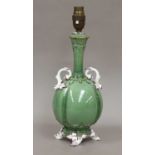 A Royal Worcester table lamp, green glazed with foliate handles and feet, 27cm (excluding fittings)