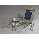 A Collection of Assorted Silver, including: a silver butter-shell; a silver photograph-frame, a/f