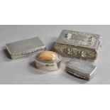 A collection of four silver boxes, two oblong, one reeded the other engine-turned, one oval and with