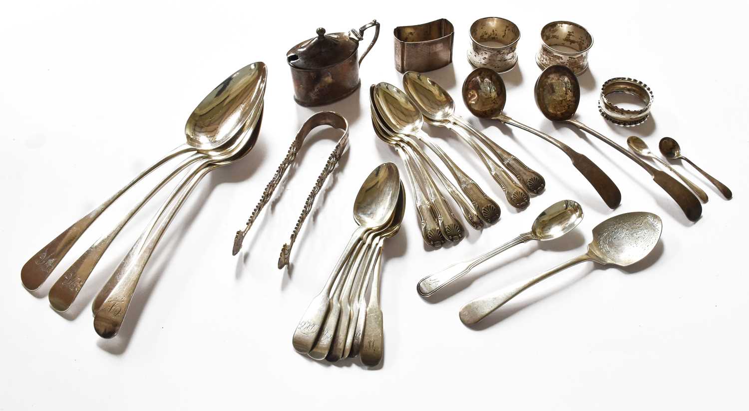 A Collection of Assorted Silver Flatware including: a pair of George III sugar-tongs; two Scottish