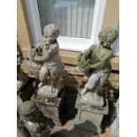 A pair of weathered composition garden statues of flower sellers, on square section plinth bases,