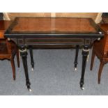 An ebonised and gilt metal mounted aesthetic movement card table, 89cm by 49cm 74cm