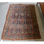 A Hamadan rug, the indigo field of stylised plants enclosed by narrow borders, 164cm by 106cm;