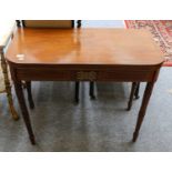 A 19th century inlaid mahogany foldover tea table, 91cm by 45cm by 76cm, together with a Victorian