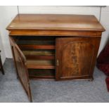 A 19th century mahogany upper section of a linen press, with later squashed bun feet and three