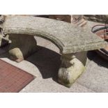 A reconstituted stone garden bench with curved rectangular seat, 107cm