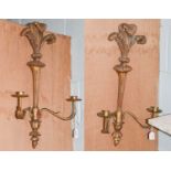 A pair of gilt painted twin light wall sconces, 60cm