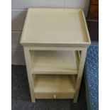 A pair of Oka green painted bedside tables, 43cm square by 71cm high, together with a similarly